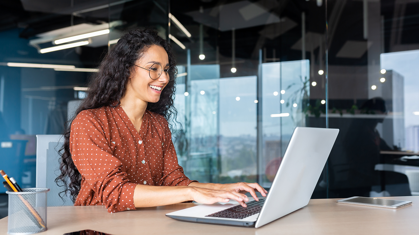 Person sitting at a laptop