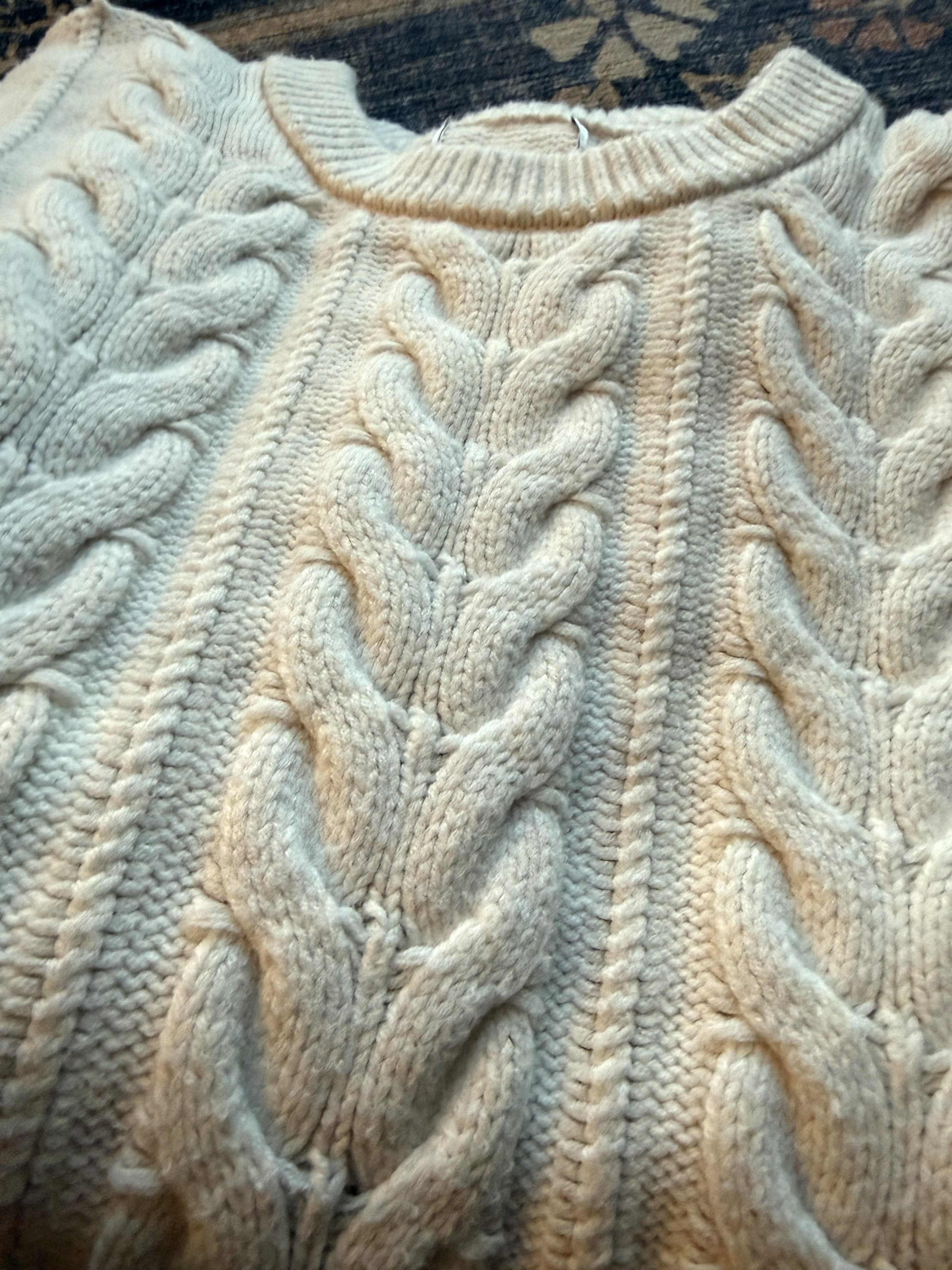Eddie Bauer Sweater close up of cream eddie bauer sweater with cable knit texture