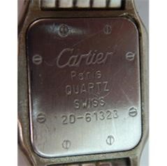 Back of fake Cartier watch showing engraved
