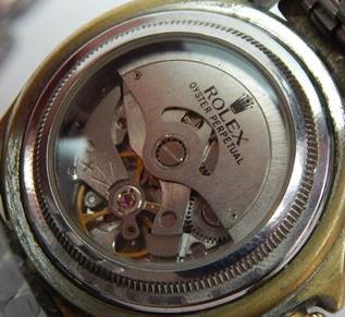 Back of fake Rolex watch missing serial number