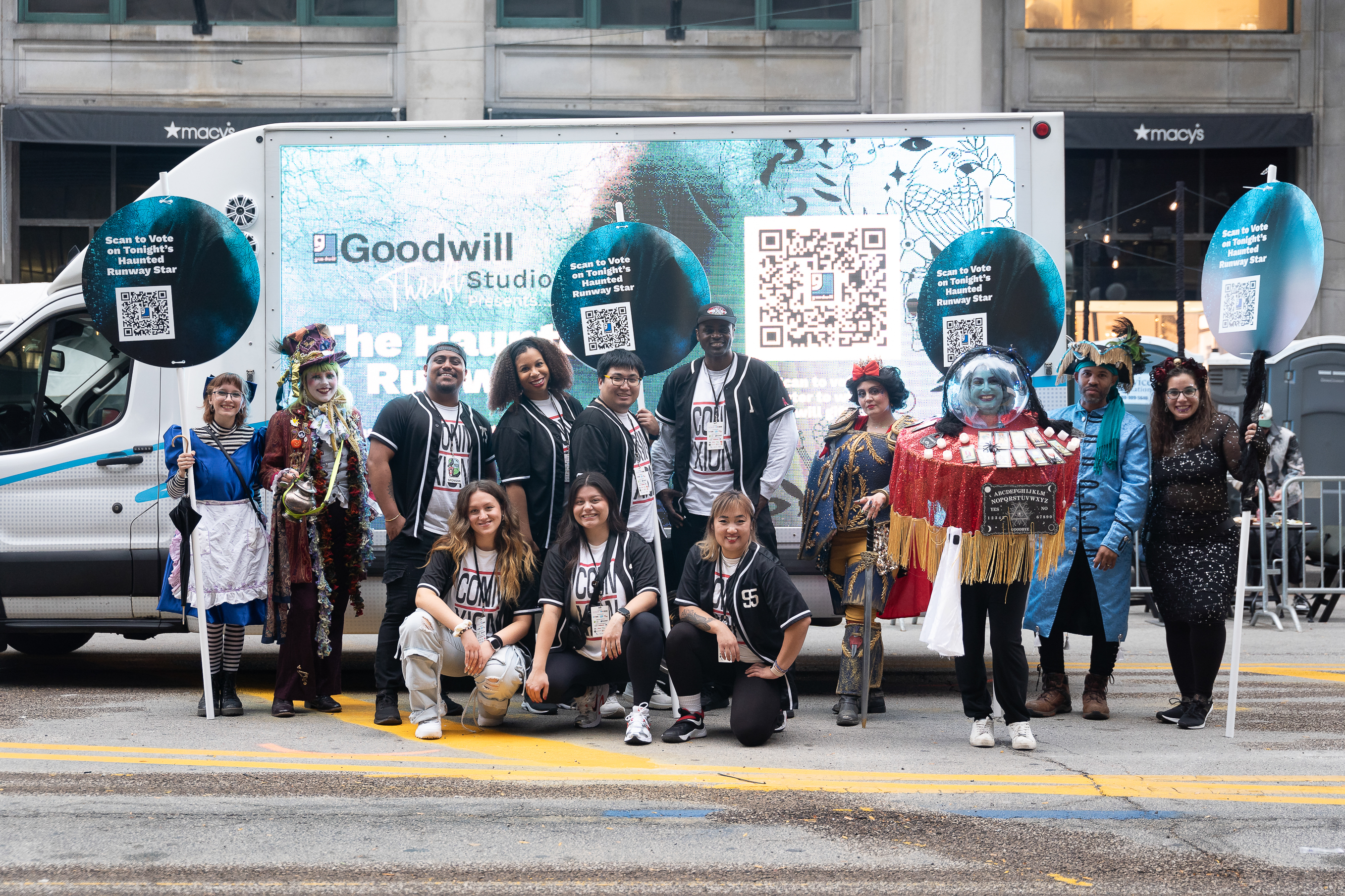 Group of diverse people posing in the street