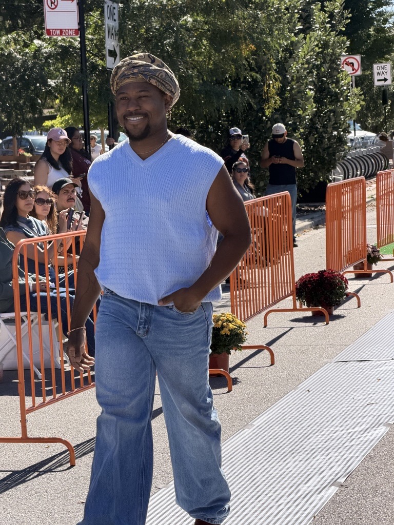 Model wearing upcycled denim, sweater and turban