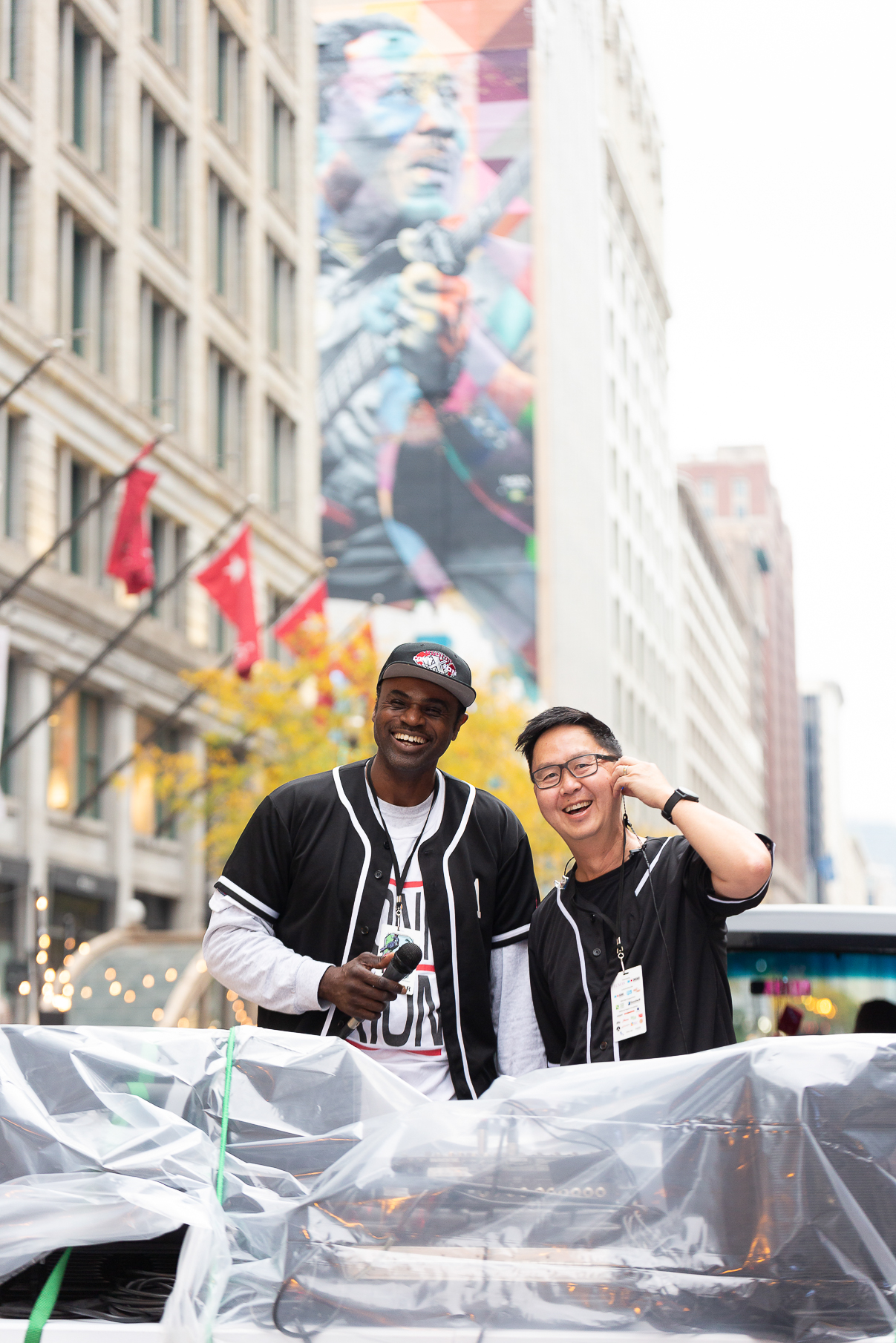 Two men smiling and posing for the camera