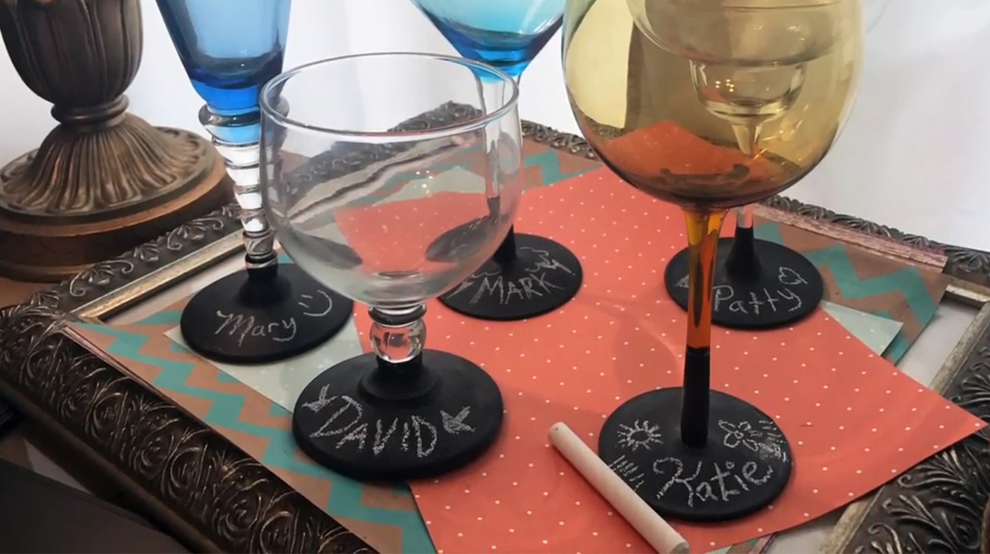 Various types of wine glasses with chalkboard paint personalization