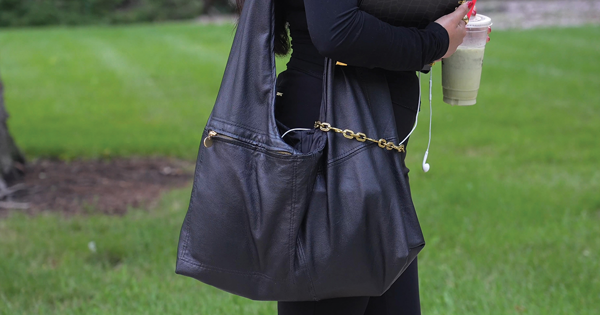 A styled DIY hobo bag being worn by a person