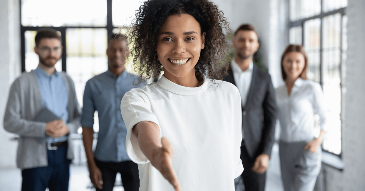 woman extending hand for a handshake