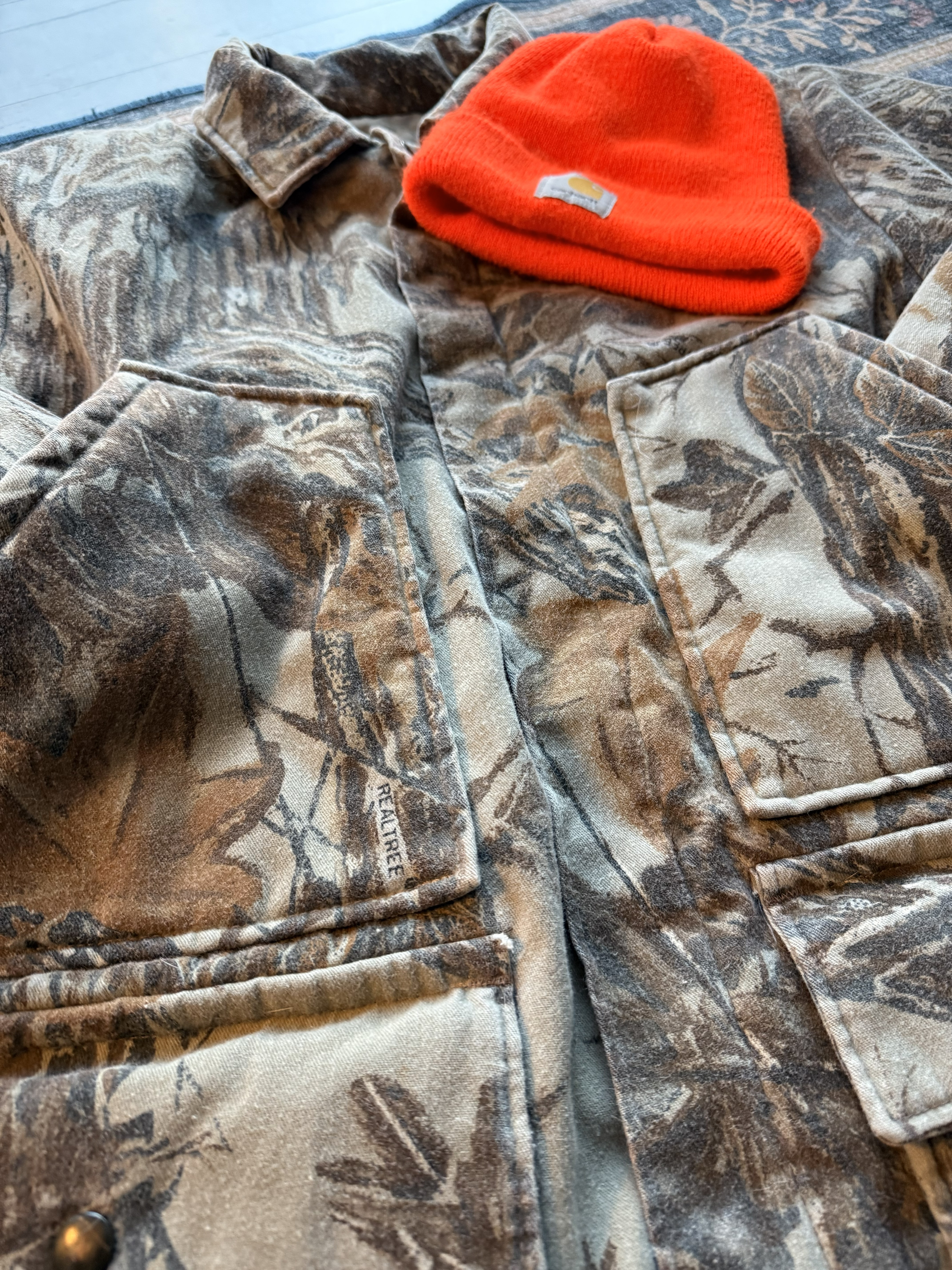 Realtree Jacket camo jacket from realtree and orange beanie