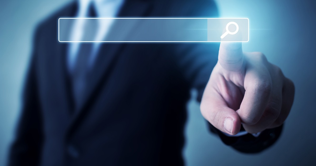 person touching computer screen