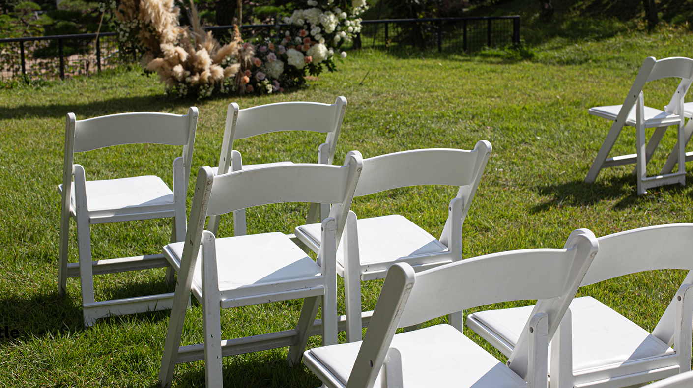 White chairs for a wedding ceremony
